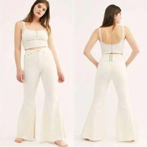 Free People we the free Crvy Super High Rise Lace Up super flare Jeans size 34
